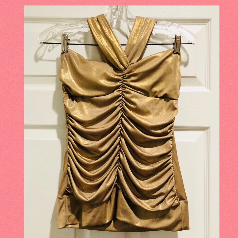 Shimmering gold sleeveless form fitting top